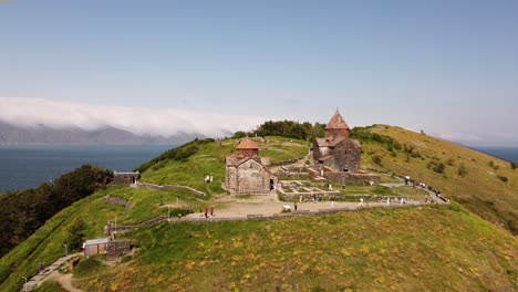 flying over an old monastery complex on the island