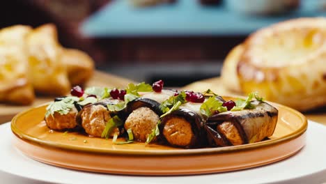 stuffed eggplant rolls with pomegranate