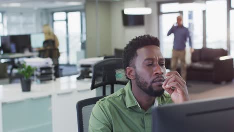 thoughtful man sitting on his desk at office