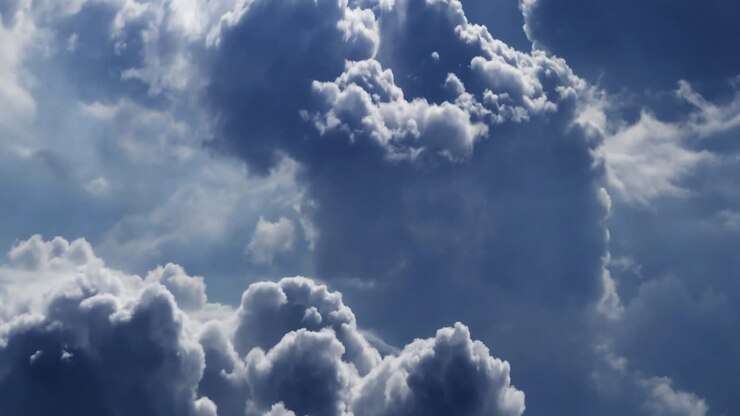 thick and dark clouds in the sky with thunderstorm