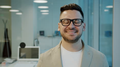 portrait of a happy businessman in an office