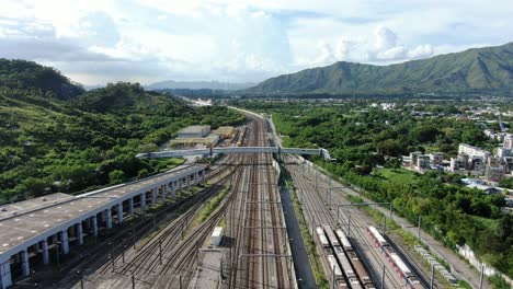 hong kong mtr railroad in the city outskirts, aerial view