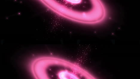 pink glowing rings and sparkling particles in animation over black background