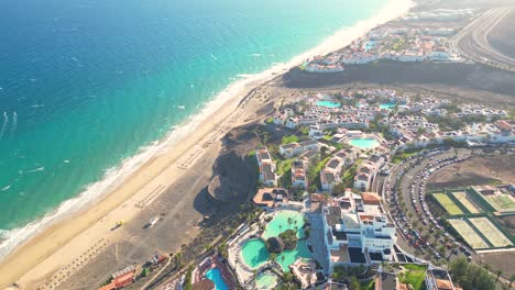 Aerial-view-of-a-luxury-hotel-along-the-coast-Hotel-Princess-Fuerteventura,-Canary-Islands,-Spain