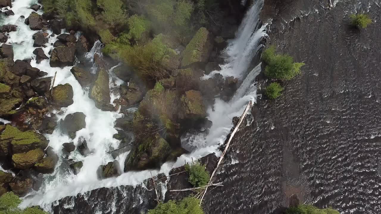 Cinematic Birdseye Aerial View of Laja Falls, Chile and Rainbow above Fresh Alpine River Waterfall