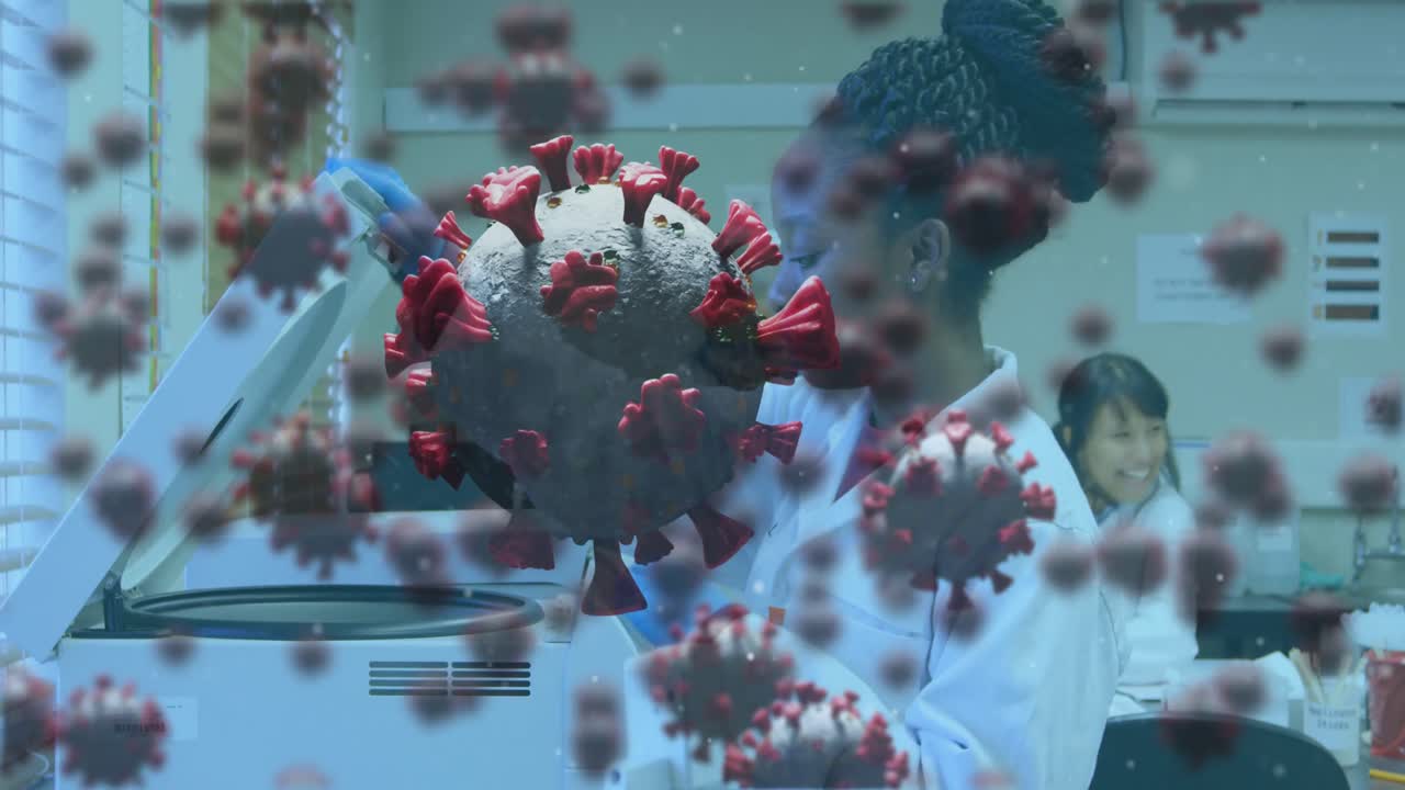 Covid-19 cells against female scientist working in laboratory