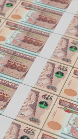 vertical video of 100 guatemalan quetzal banknotes printed by a money press