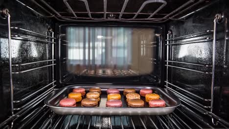 baking macarons in the oven.