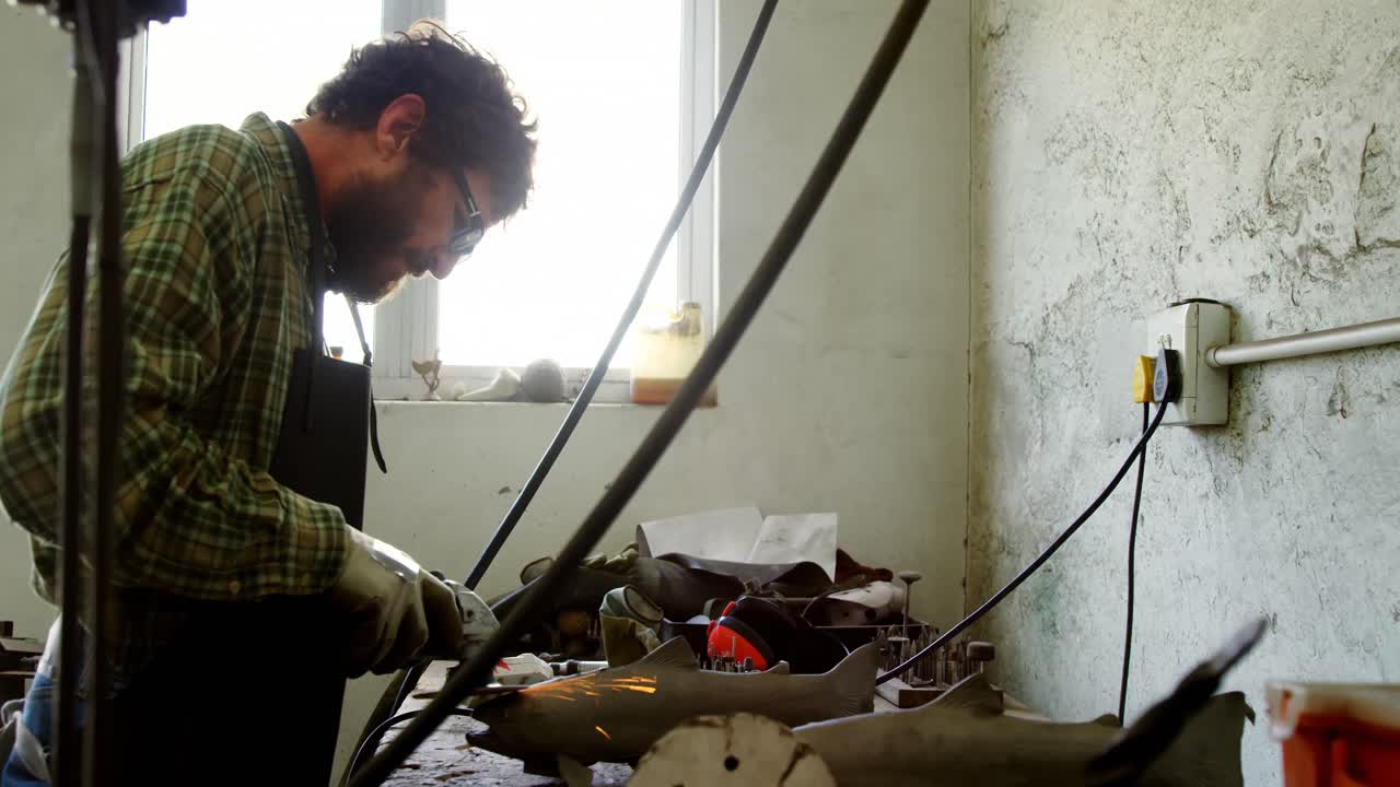Craftsman working at workshop 4k
