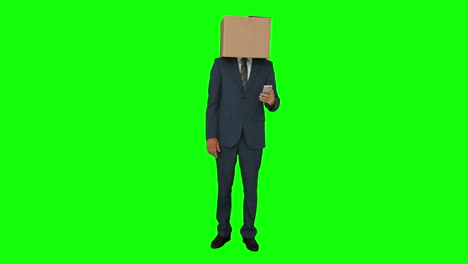 businessman standing with box over his head