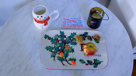 leftover cookies and milk and letter from santa on christmas morning