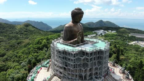 hong kong nong ping big buddha and surrounding lush green environment, aerial view