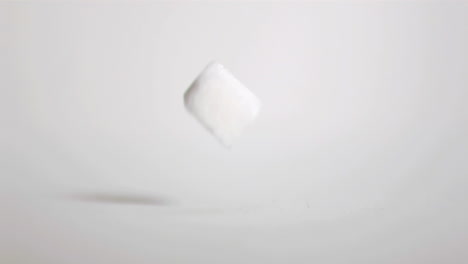 Sugar-cube-falling-down-in-super-slow-motion