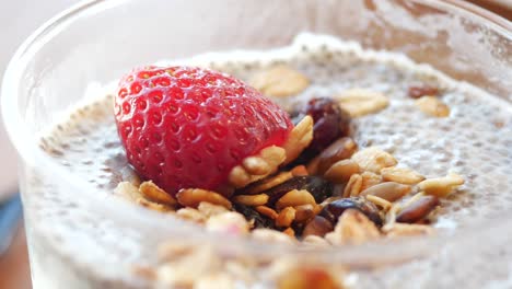 healthy and delicious chia pudding with strawberry and granola