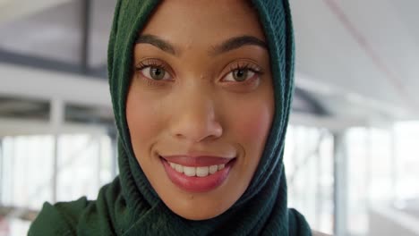 portrait of young woman in a creative office