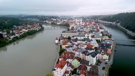 landing drone flight over river inn and danube in passau, germany with distinctive colour difference