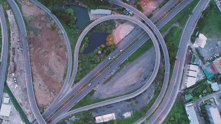 4K Time lapse or Hyper lapse : Aerial view network or intersection of highway road for transportation or distribution concept background.
