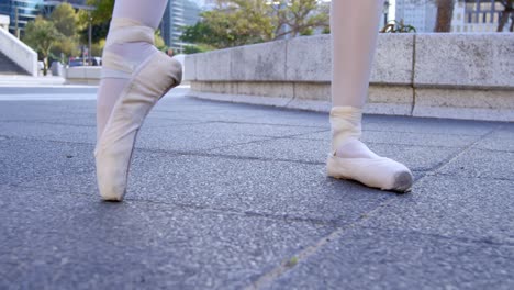 ballet dancer performing on the pavement 4k