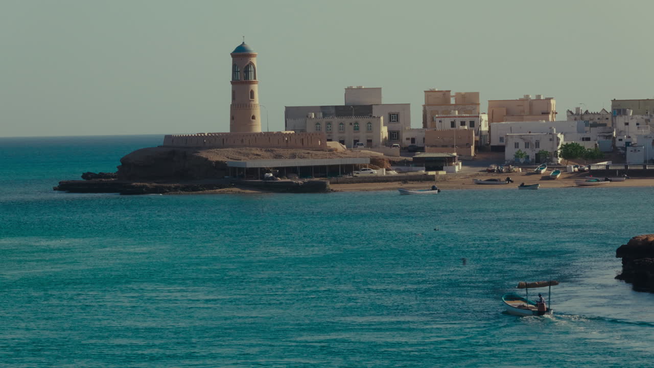 Coastal Town Scene with Lighthouse and Fishing Boats