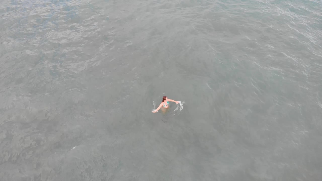 playa españa malaga nerja en un día nublado de verano usando un dron y una cámara de acción estabilizada-33