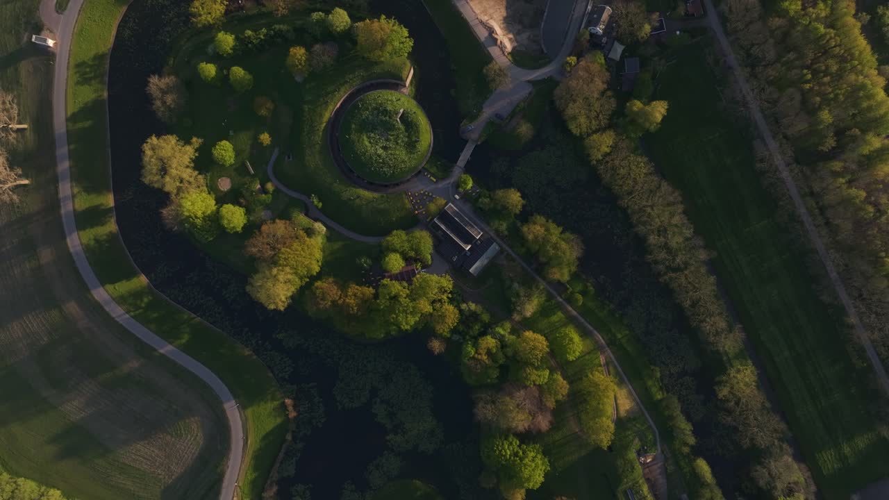 Warm sunset casting light on Fort Vuren and Waal River, Netherlands