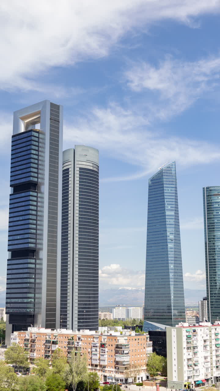 Timelapse of the madrid financial district in vertical