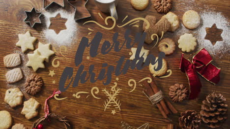 merry christmas text animation over festive cookies and baking ingredients on wooden table