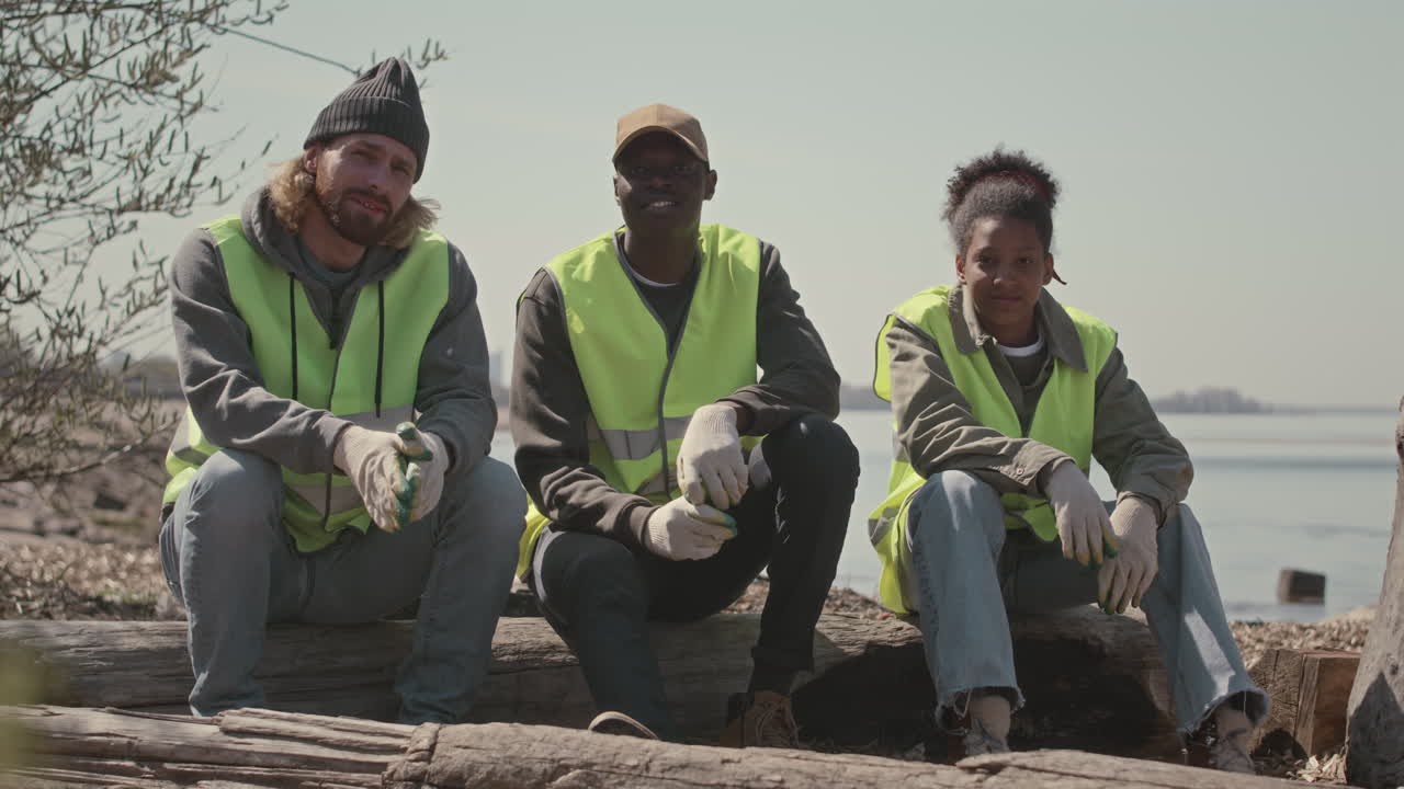 Group Portrait of Environmental Volunteers on Beach