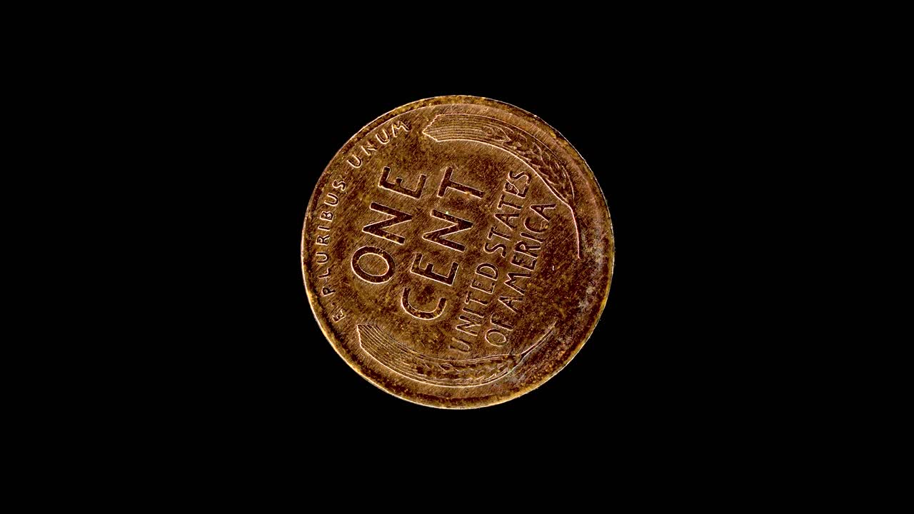 United States 1917 1 cent coin reverse with wheat ears and denomination rotating on black background