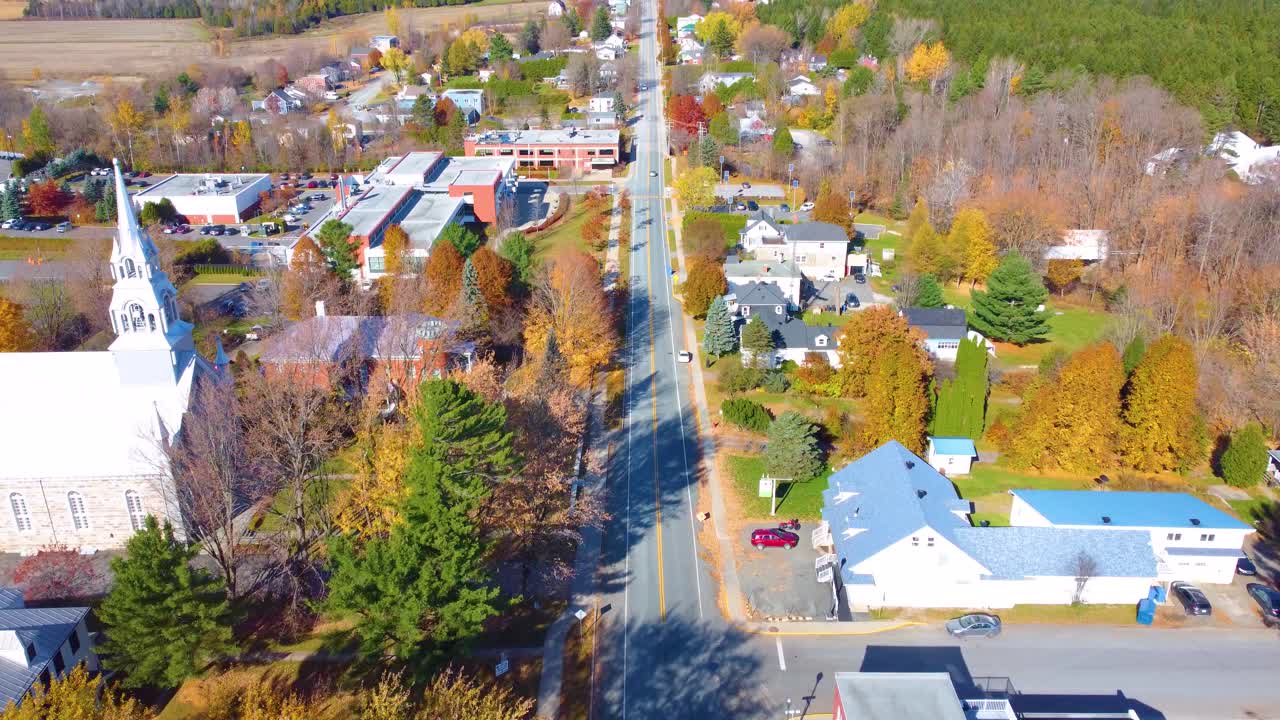 Cozy small Canada township with autumn colors, aerial view