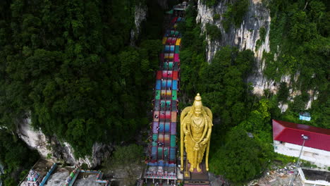 Aerial-View-Of-Murugan-Statue-At-Batu-Caves-In-Gombak,-Selangor,-Malaysia