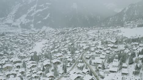 drone aerial of the beautiful resort and spa town verbier in the swiss alps