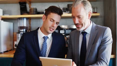 Businessman-interacting-using-digital-tablet