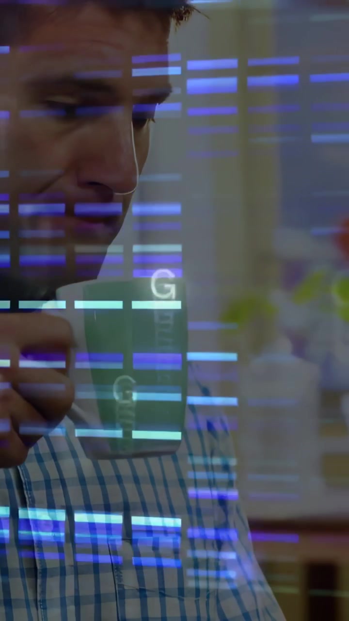 Vertical video: Man tapping tablet, checking data in tech while sipping mug, causing blue overlay
