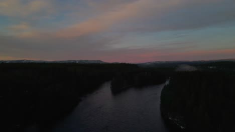 Reveal-Islands-in-the-River,-Romantic-Pink-and-Yellow-Sky-During-Sunset,-Rising-Aerial