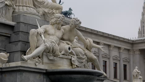 classical statues of pallas athena fountain in vienna