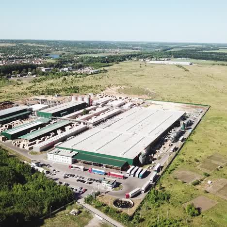 location of the production facilities of the plant for the manufacturing of a parquet board outside the city. aerial view