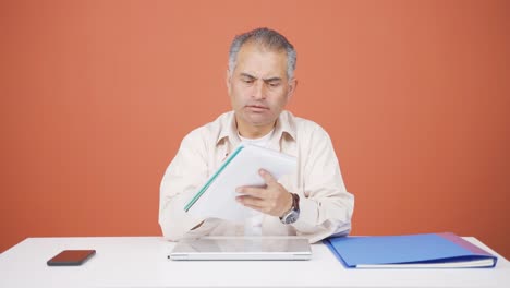 Man-with-notebook-thinks-and-takes-notes.