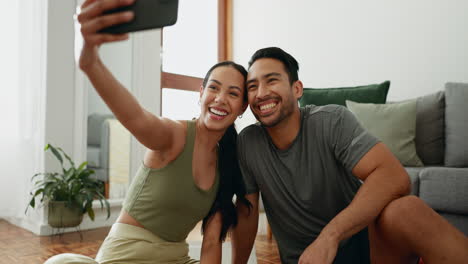 Happy-couple,-selfie-or-peace-at-house-living-room