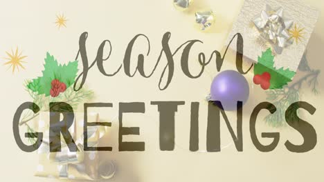 animation of seasons greetings text over christmas decorations