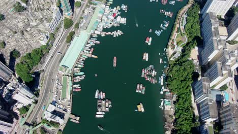 aberdeen harbour and skyline in southwest hong kong island on a beautiful day, aerial view