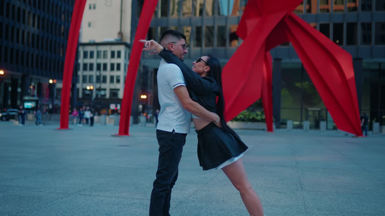 Urban scene with young fresh married couple in Chicago downtown. Love story