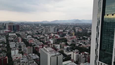 Drone-flight,-Mexico-City-from-above.-Modern-architecture