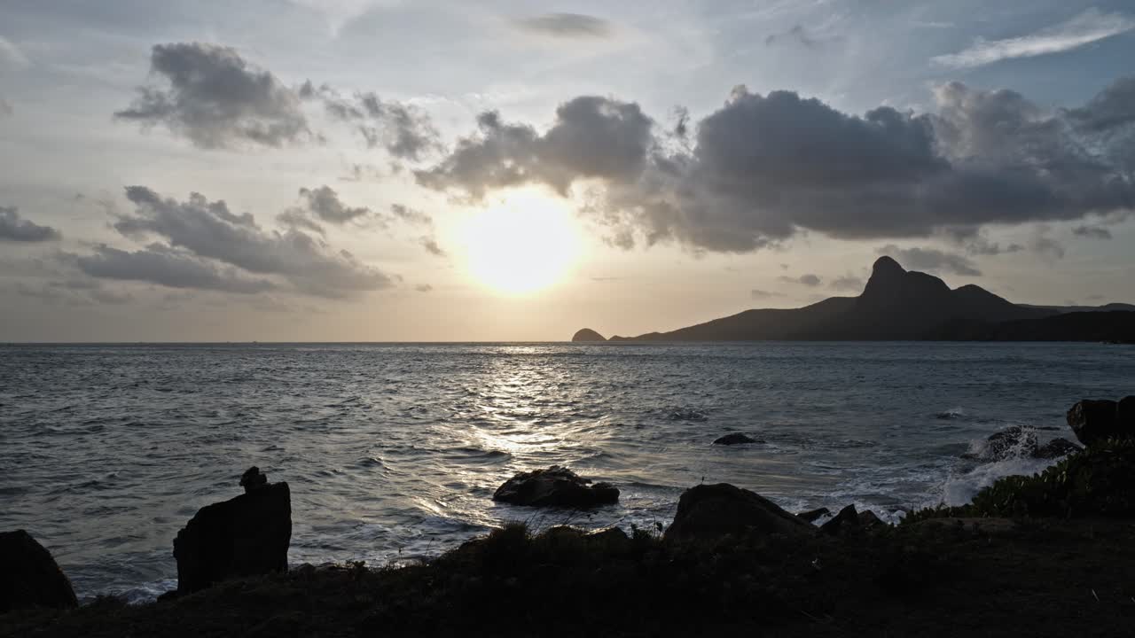 Dark shot of B&atilde;i Nh&aacute;t beach in Con Dao Island in Vietnam during sunset or sunrise