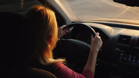 silhouette of a female driver driving a car