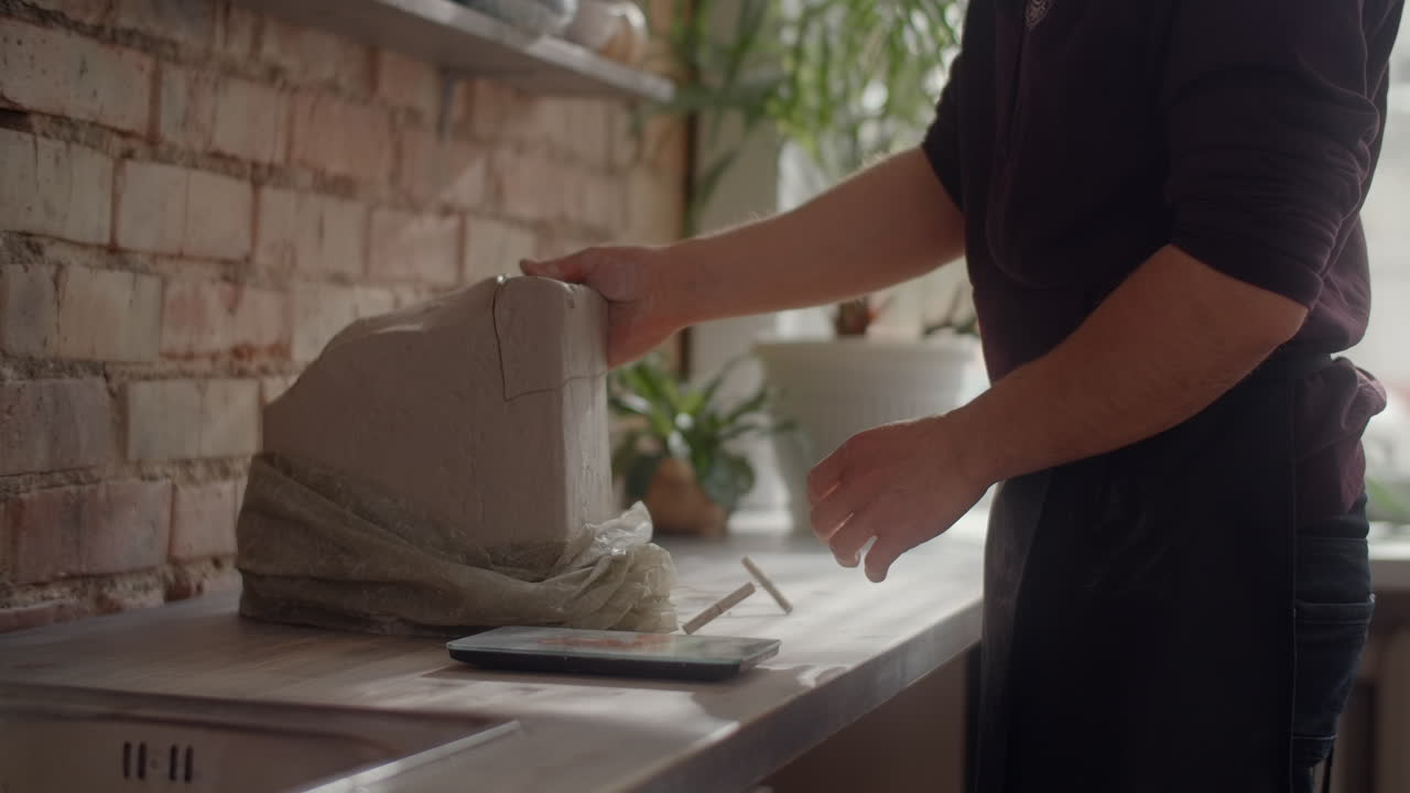 Sculpting Clay in an Artistic Studio