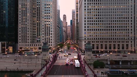 chicago skyscrapers with train bridge aerial view