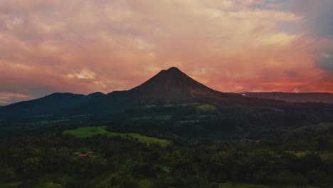 seamless video loop - cinemagraph time-lapse of the impressive arenal volcano at la fortuna, costa rica by sunset