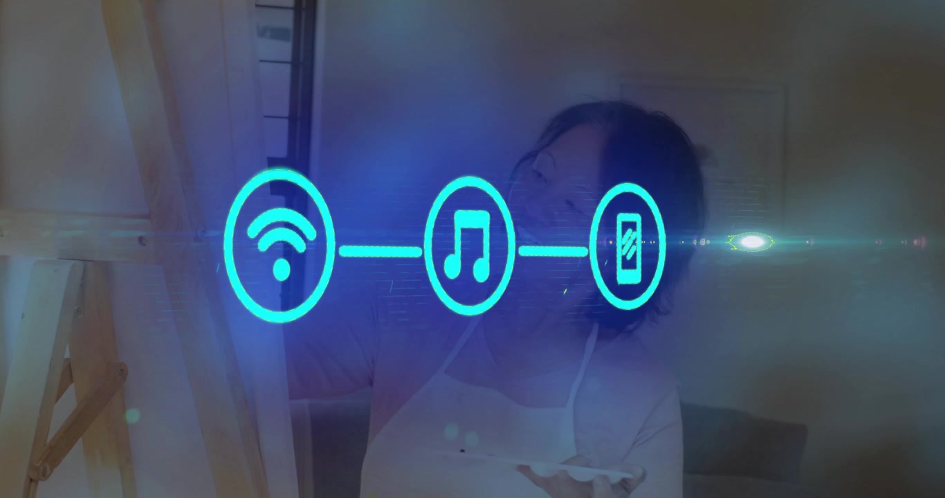 Pittore anziano che applica una pennellata, attivando un marcatore che anima icone di Wi-Fi, musica e telefono per il design