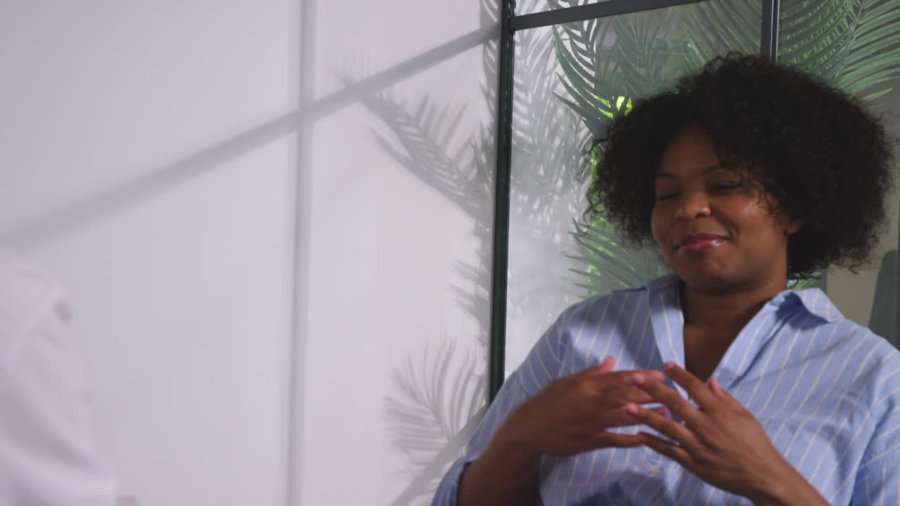 Relieved Woman Being Given All Clear By Doctor Or Oncologist At Meeting In Treatment Clinic For Breast Cancer In Hospital 5
